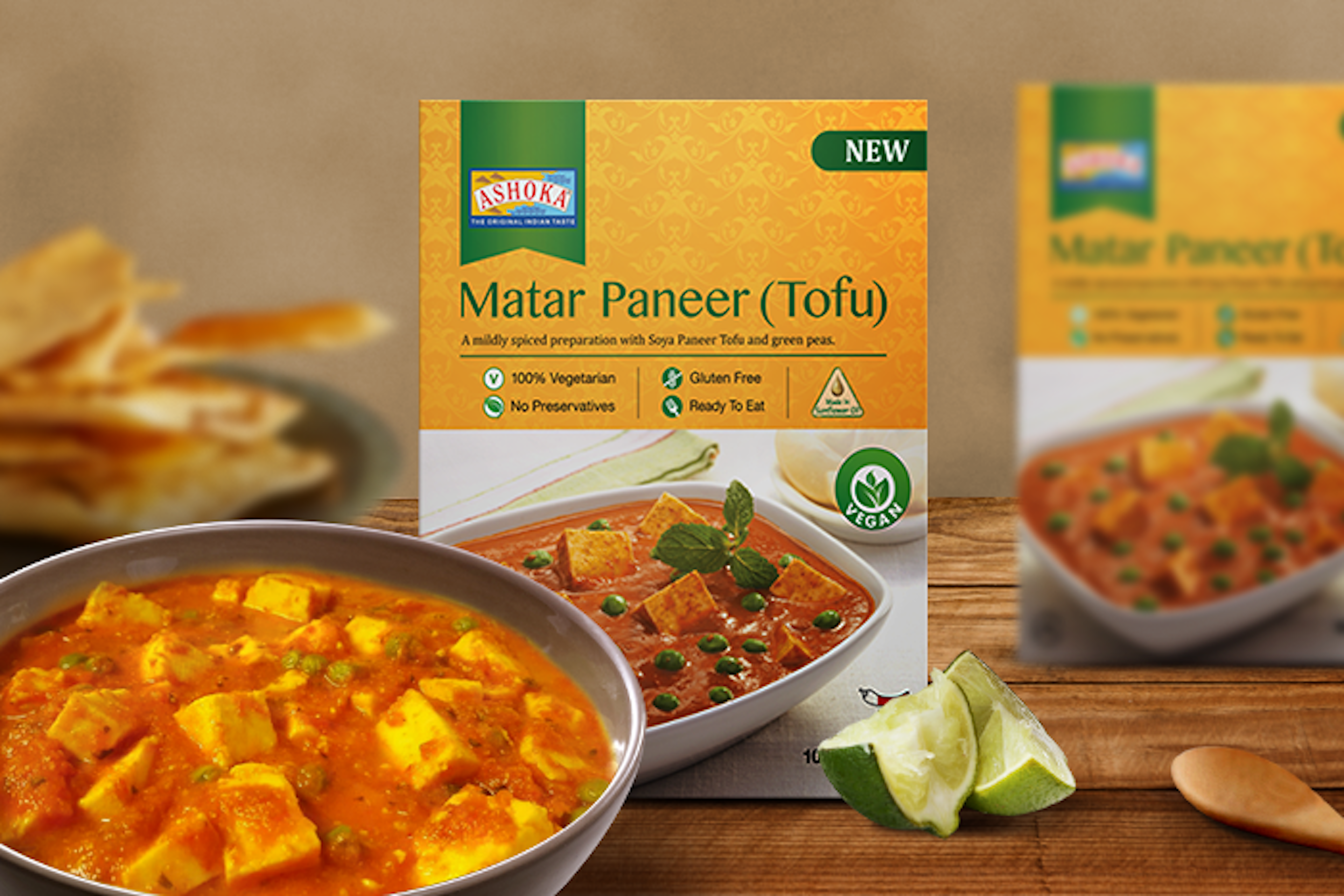 Zutaten von Ashoka Matar Paneer Tofu: Tofu, Erbsen, Tomaten und Gewürze.